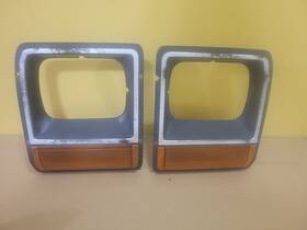 4991500 Chrysler 1981-1985 Dodge Truck Ram Ramcharger D150 D250 Headlight Bezel Trim Oem Pair Set