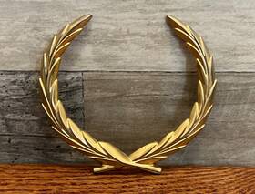 20348828 General Motors 20212951 1980-1992 Cadillac Trunk Lock Emblem Outer Panel Wreath - Genuine Gm