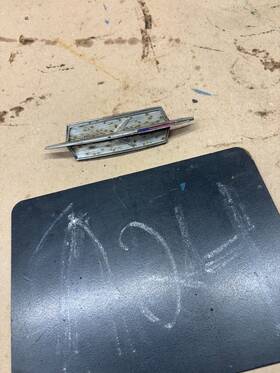 4489454 General Motors 1965 65 Cutlass F85 442 Center Hood Molding Trim Emblem Chrome Used Oem