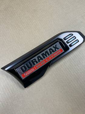 87858873 General Motors 2020 - 2023 Gmc Sierra 2500 3500 Duramax 6.6 Liter Right Fender Vent Emblem