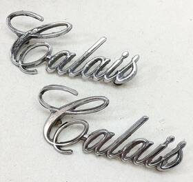 9834649 General Motors 71-76 Cadillac Calais Rear 1/4 Panel Script Inch Emblem Pair