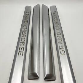 55156847 Jeep 05-10 Grand Cherokee Exterior Door Moulding Trim Platinum Left Right Set