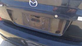 B25f50810b08 Mazda 99-03 Protege Mazdaspeed License Plate Trim Surround Panel Tail Trunk Finish