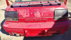 Pontiac 10102989 1988-1996 Grand Prix Rear Tail Panel Oem Trim Moulding Strip Red 2 Door