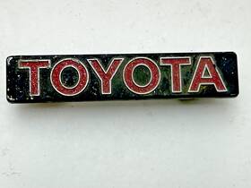 75311-12570 Toyota 1975-1980 Corolla Ke35 Grill Emblem Metal Trim Molding Ornament