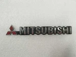 Mitsubishi Badge With Logo (rear/left) 19CM X 2.5CM MB619215-1. Fixed Price $14.49.