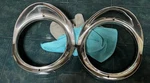 1957 Oldsmobile Headlight Bezels. Fixed Price $69.00.