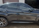 15 16 17 18 19 X6 Right Rocker Panel Molding Sport, Black Saphire Metallic. Fixed Price $325.00.