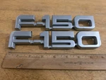 2 Oem E8TB-16B114-AA Truck Fender Emblem/badge. Fixed Price $18.50.