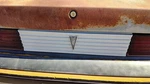 85-87 Pontiac Sunbird License Plate Trim Surround Panel 2DR Tail Trunk Finish. Fixed Price $106.81.
