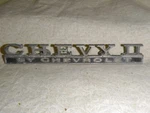 Vintage Oem Chevrolet Chevy Ii Metal Emblem 7745749 Ornament. Fixed Price $44.00.