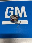 Nos 80 96 Cadillac Trunk Lock Cover Emblem Crest Deck Slider Gm Flipper. Fixed Price $129.00.