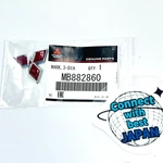 Mitsubishi Genuine 1994-2001 Galant & Mirage Red Triple Diamond Emblem MB882860. Fixed Price $28.46.