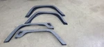 Used Genuine Jeep 55254918 Fender Flare Kit 1997-2004 Wrangler. Fixed Price $250.00.