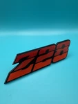 Nos 1980 1981 Chevrolet Camaro Front Grille Emblem Tri Color Red 14013868. Fixed Price $59.99.