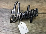 1970-77 Dodge Series Van Nos Mopar Rear Door Script Emblem 2956722. Fixed Price $65.00.