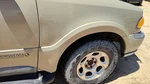 1998 Navigator Passenger Right Front Wheel Flare Moulding Fender Gold Bi. Fixed Price $315.88.