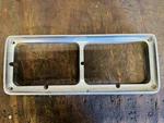1976-1977 Driver Left Headlight Bezel Oldsmobile Cutlass 551469. Fixed Price $18.00.
