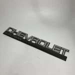 95-99 Suburban Rear Tailgate Passenger Door Chevrolet Emblem. Fixed Price $31.00.