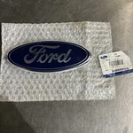 Genuine Ford AE5Z-5442528-A Rear Deck Lid Emblem AE5Z5442528A. Fixed Price $54.85.