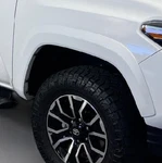 2016-23 Toyota Tacoma Front Rh Wheel Arch Fender Flare Molding White 040 Pass. Fixed Price $225.00.
