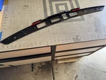 New Oem 16-20 Tesla Model X Liftgate Number Plate Holder Trim 1035370-00-B. Fixed Price $78.00.