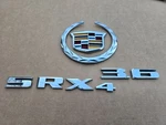 Cadillac 10-16 Rear Liftgate SRX4 3.6 Emblems Oem 23491048, 25928690. Fixed Price $49.99.