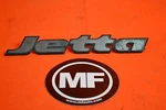 165 853 687P Vw Oem Jetta Badge. Fixed Price $14.95.