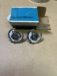 2 Nos Cadillac Roof Pillar Emblems 7799960 White 1966 1967. Fixed Price $95.00.