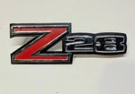 1970-74 Chevrolet Camaro Z28 Front Fender Emblem Gm Oem 1/2"X4 1/4" #3982067. Fixed Price $39.95.