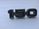 75 82 Ford Econoline 150 Fender Emblem Badge Name Plate D5UB-1129100-B. Fixed Price $29.95.