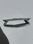 1954 Chevy Bel-air Front Hood Emblem Bezel Only Original/ New/ # 3705034. Fixed Price $80.00.