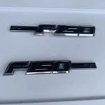 Pair 09-14 Ford F-150 Xlt Fender Emblems 9L34-16B114-CD. Fixed Price $25.00.