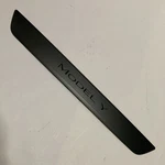 Tesla Model Y Door Sill Plate 1494301-00-B. Fixed Price $28.00.