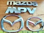 Mazda Mpv Circa '03 Rear Emblems LC62 51710 / 51721 47P 730 CE1747). Fixed Price $24.00.