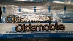 Set Of 2 - Nos Oem Genuine Gm Oldsmobile Gold Name Plate Emblems. Fixed Price $31.50.