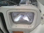 Surrounding Trim Driver Left Headlight Door/cover Painted Fits 87-95 Wrangler 15. Fixed Price $24.00.