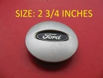 2000-2011 Ford Focus (1) Wheel Rim Center Cover Plug Used #9023. Fixed Price $10.00.