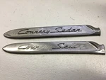 Original Pair Of 1953 Ford Country Sedan Left Lh Fender Emblems BF-16189-C. Fixed Price $18.00.