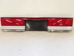 Plymouth Acclaim 1989-1992 Tail Panel -center Lid Mounted License Plate Pocket. Fixed Price $117.50.
