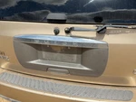 04-05 Rainier License Plate Trim Surround Panel Tail Trunk Finish Cashmere 15U. Fixed Price $400.00.