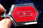 Oem 1976-1977 Cutlass Supreme Header Panel Red Hood Ornament Emblem. Fixed Price $99.99.