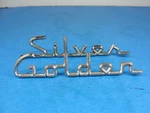 Vintage 1957-58 Studebaker Silver & Golden Script Trunk Emblems. Fixed Price $45.00.