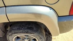 2002-2004 Jeep Liberty Driver Left Rear Wheel Flare Moulding Oem Back Khaki Pjc. Fixed Price $150.00.